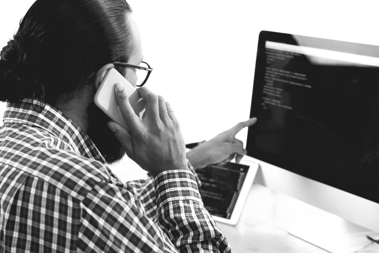 Development process showing mobile interface design and technical architecture